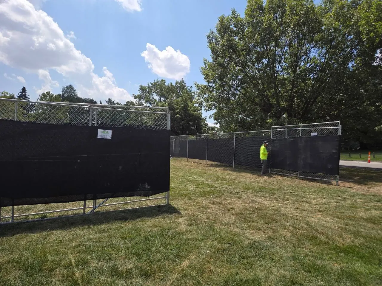 8-foot chain-link with black windscreen — Midway Rent-A-Fence